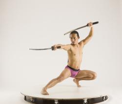 Man Adult Athletic Fighting with sword Kneeling poses Underwear